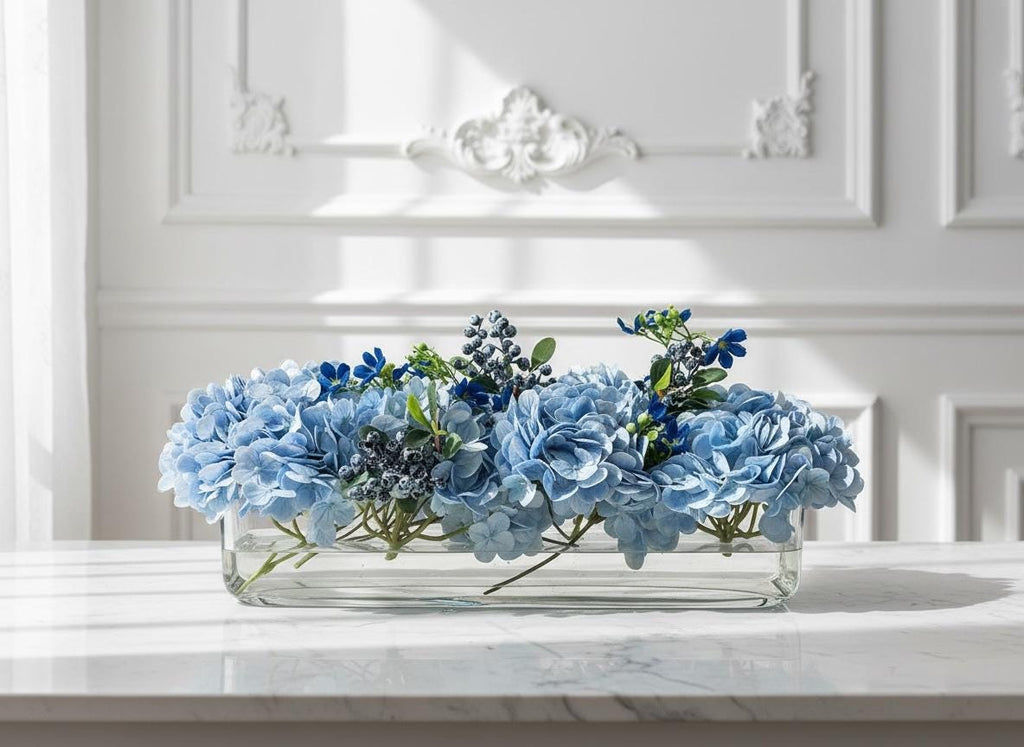 Faux Floral Centerpiece in Long Glass Vase with Artificial Water