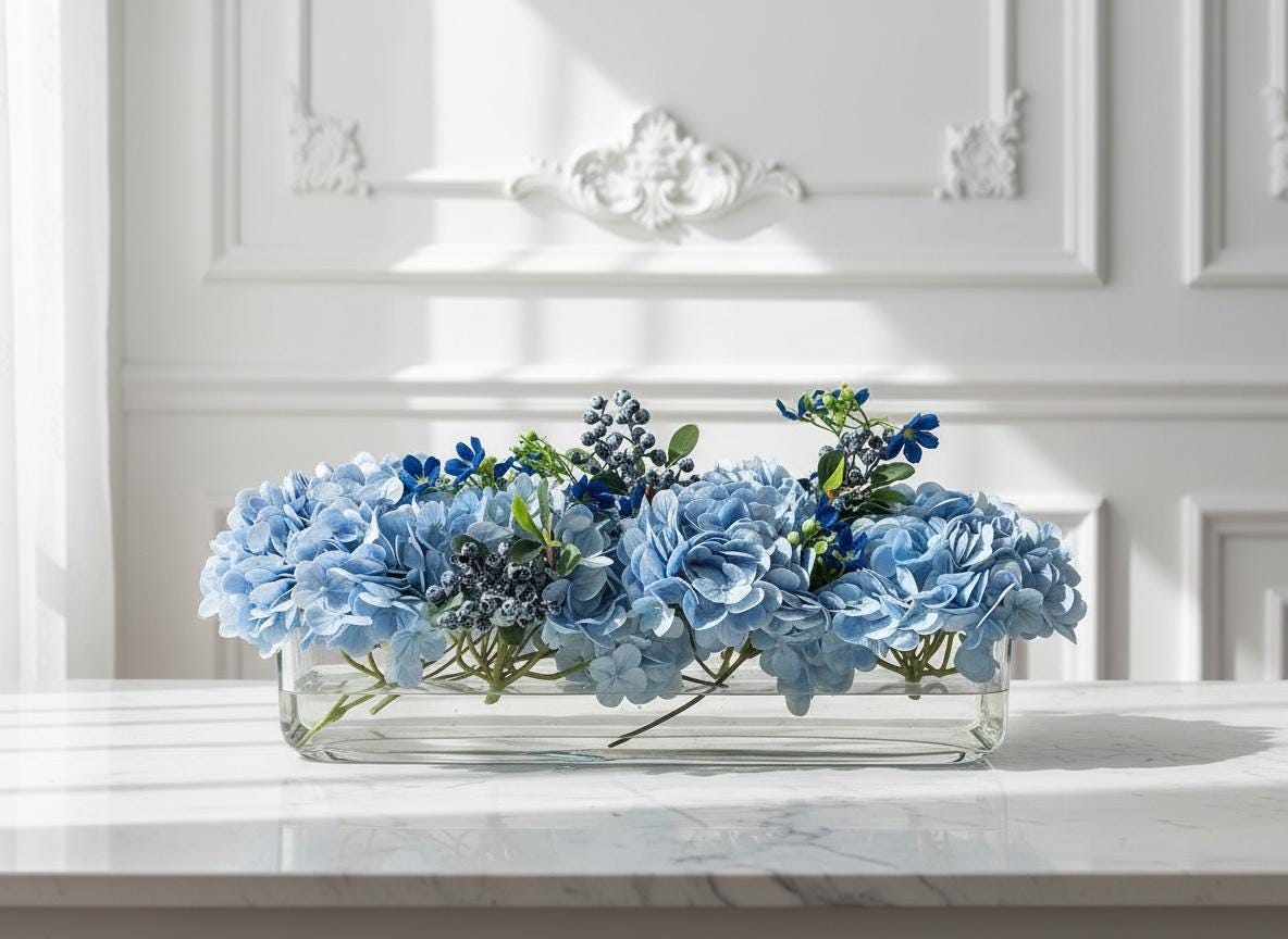 Faux Floral Centerpiece in Long Glass Vase with Artificial Water